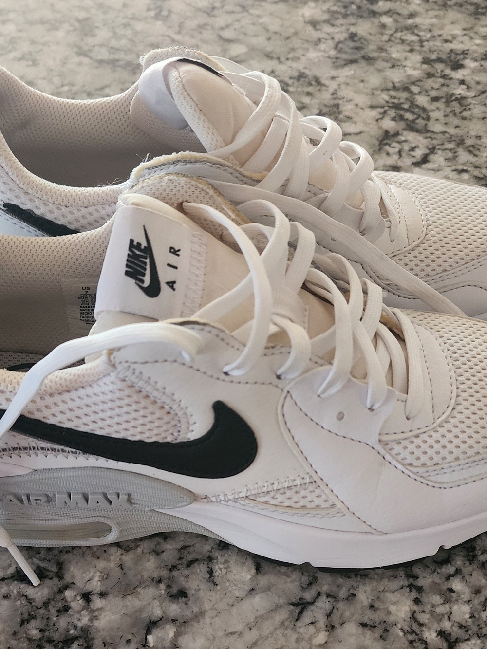 Nike White Sneakers with Black Swoosh